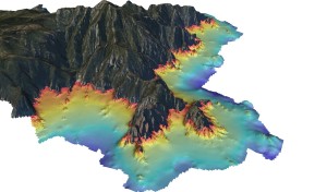 Figure 4: Modèle Numérique de Terrain d’une bathymétrie fine (pixel de 2 m) pour la cartographie des récifs coralligènes. (en gris la zone terrestre, en rouge la zone -10 m et en bleu foncé la zone à -60 m) © Andromède océanologie